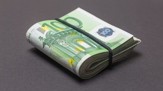 A,Bundle,Of,100,Euro,Banknotes,Folded,In,Half,On